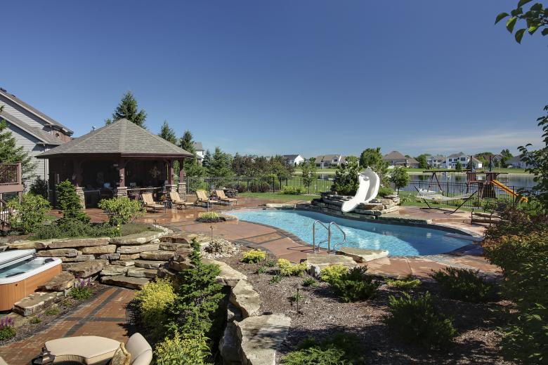 Architecural Photo of a landscaped patio area.