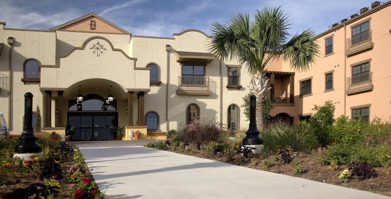 An architectural photo of the exterior of a senior living facility.